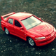 Illustration for article titled Mitsubishi Lancer Evo VIII - Welly Nex 1:60